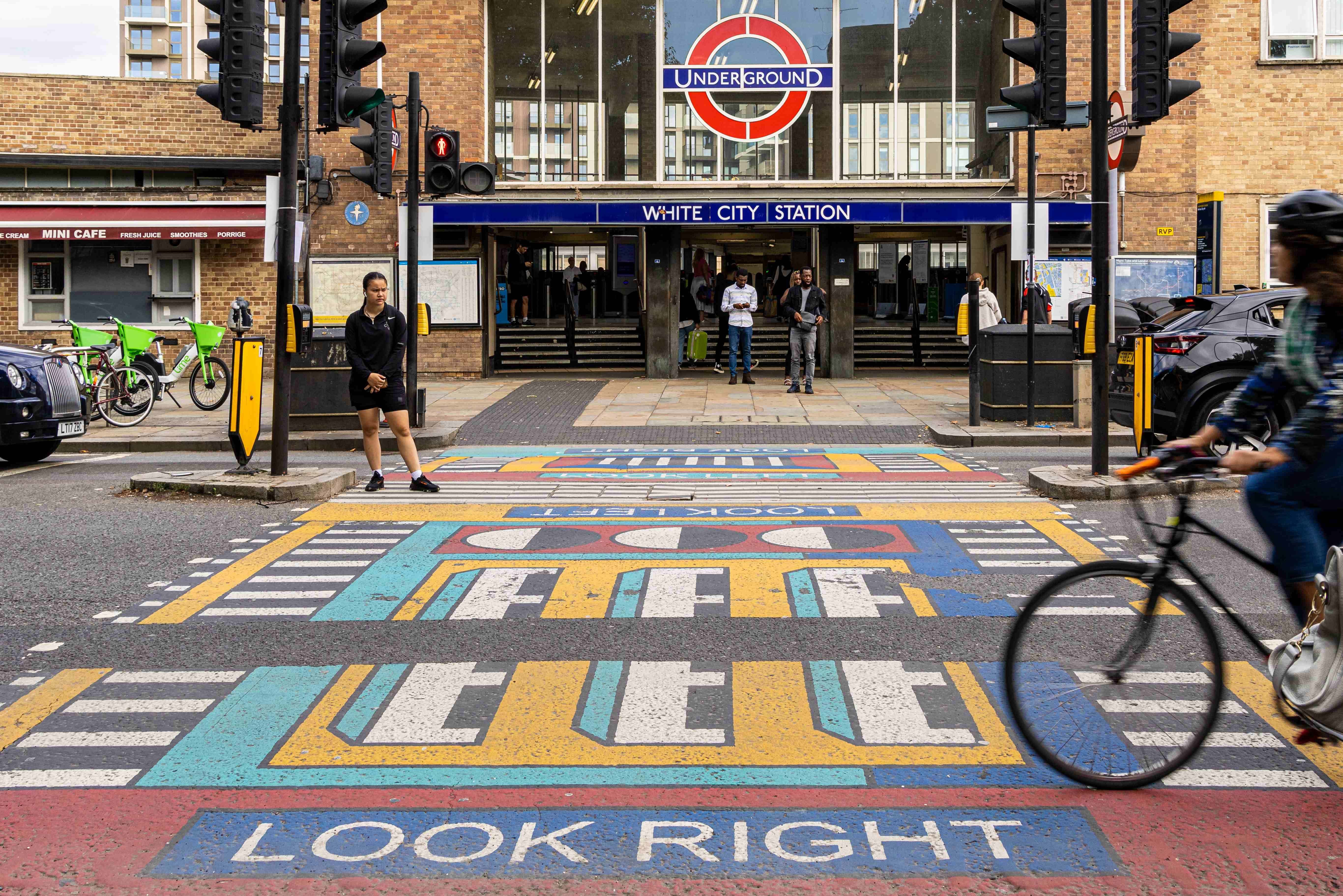 pedestrian crossing in front of White City tube station